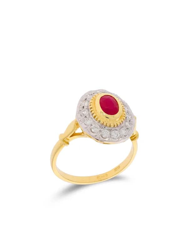 Bague pour dame – bicolore avec rubis et diamants 0.42ct